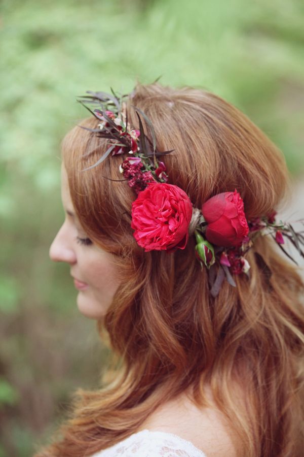 Long curls with a red flower crown