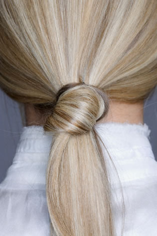 Knotted low ponytial hairstyle