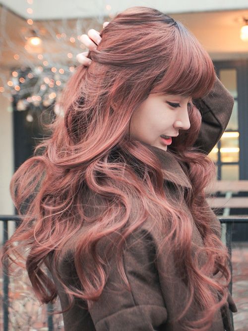 Colored long wavy hair with blunt bangs for Asian hairstyles