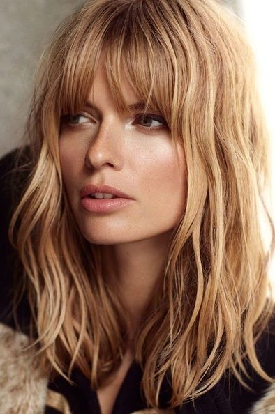 Long shaggy hairstyle with bangs for blonde hair