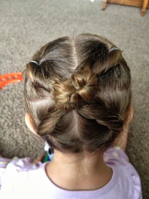 Cross bun hairstyle for little girls