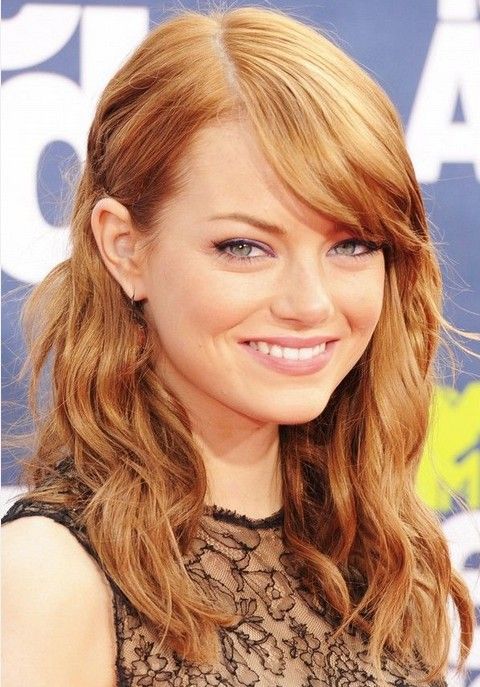 Parted parted curly hair - Emma Stone hairstyles