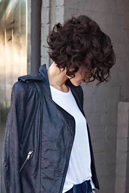 Short dark chocolate curly hairstyle