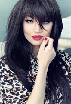 Long black straight hairstyle with bangs