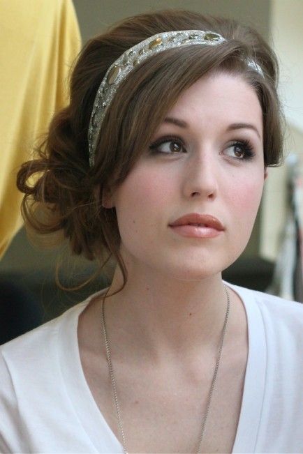 Elegant loose bun hairstyle with a headband