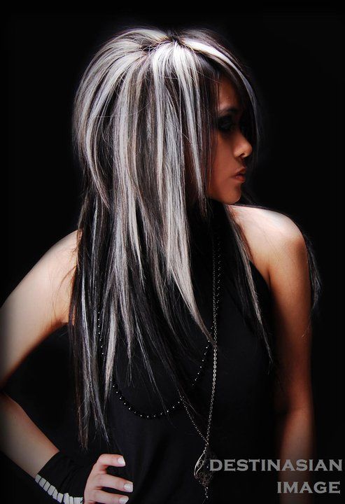 Layered straight black hair with blonde highlights