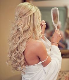 Long blonde curly hairstyle