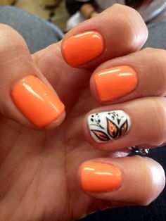 Tribal orange nail design