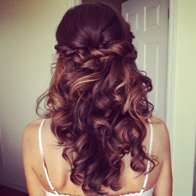 Twisted curly hairstyle for bridal wear