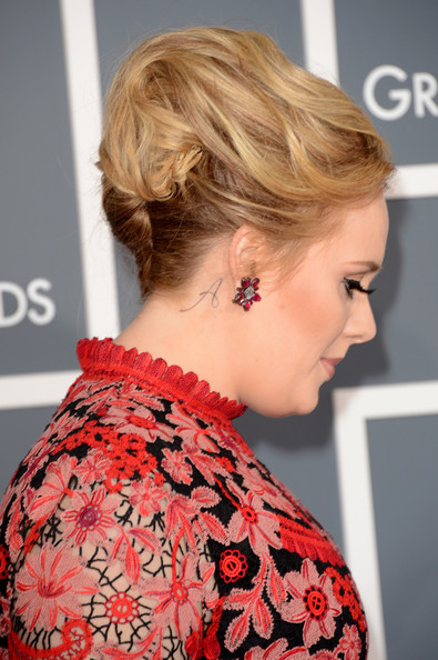 Adele French Twist / Getty Images "width =" 458 "class =" size-full wp-image-30676