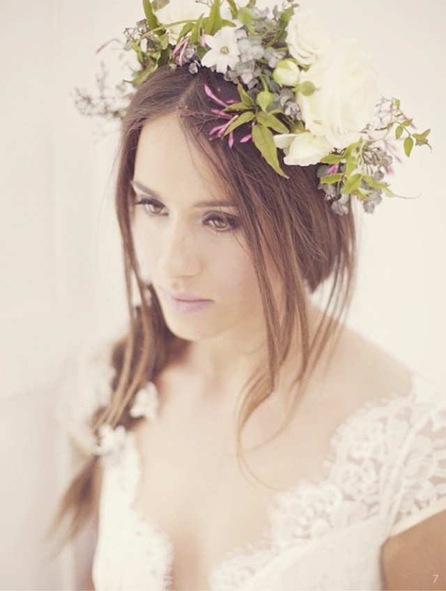 Fairy braided wedding hairstyle with flowers