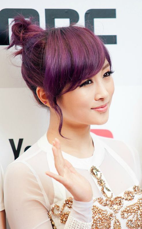 Adorable topknot for purple hair