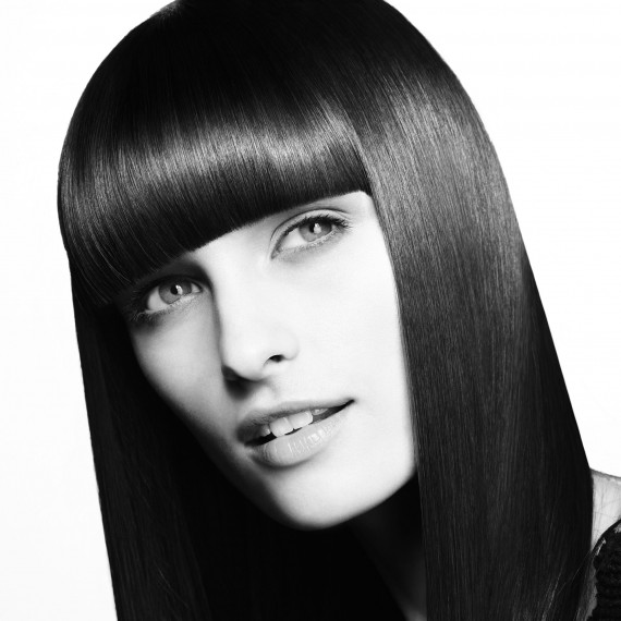 Long straight hairstyle with blunt bangs