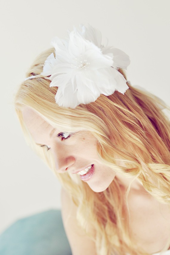 Long wavy flower bridal hairstyle over
