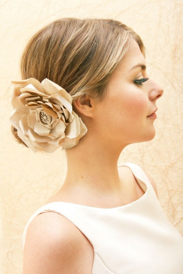 Flower bun bride hairstyle over