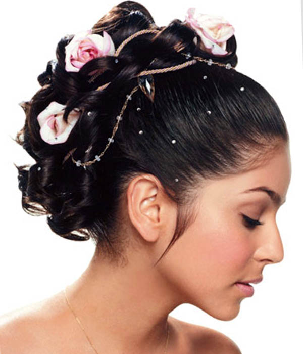 Flower bun bride hairstyle over