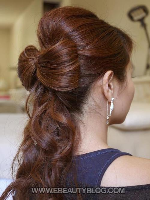 Ponytail bow hairstyle over