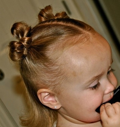 Bun bow hairstyle for your daughter over
