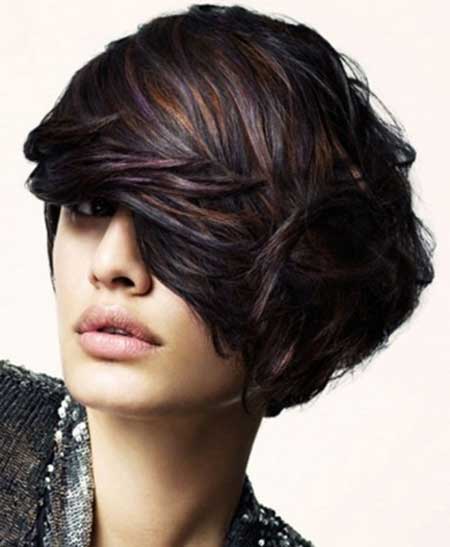 Dark short hair with a golden sheen