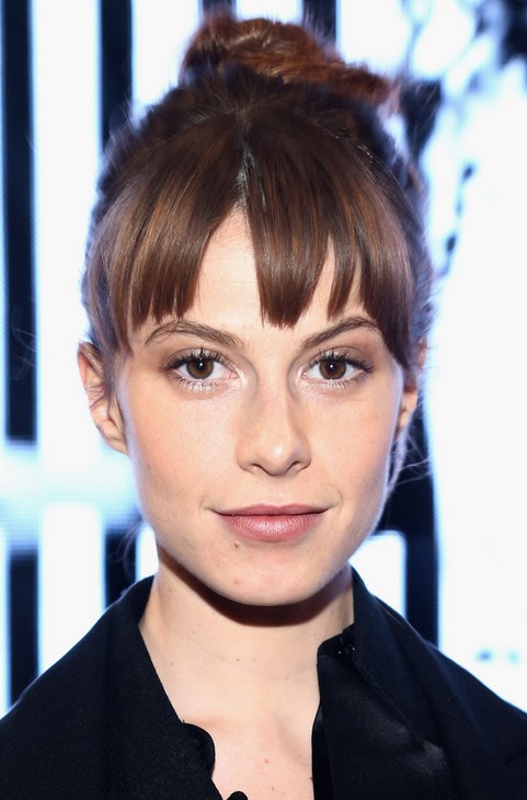 Elettra Wiedemann updo hair bun with swept bangs