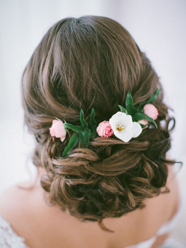 Bridal hairstyle with flowers