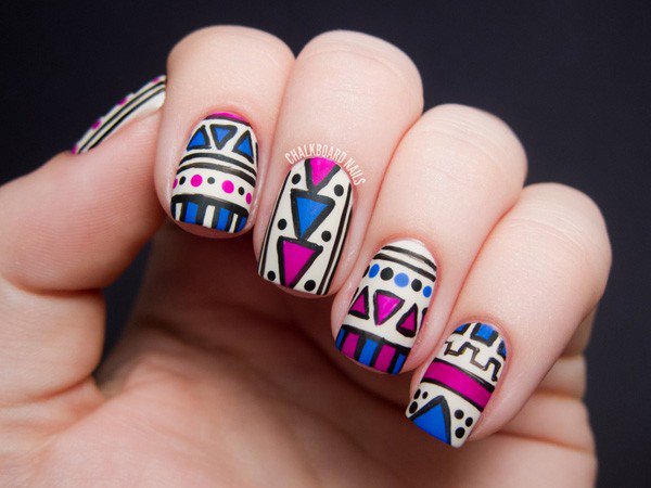 White and blue tribal nail design