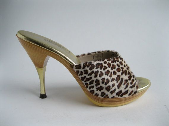 Amazing leopard print Polly of California mules are made of .
