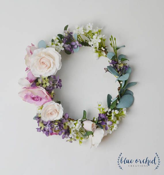 This beautiful, flower crown is filled with greenery, cream .