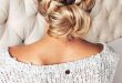 Picture Of a double braid updo with a low bun will last as long as .