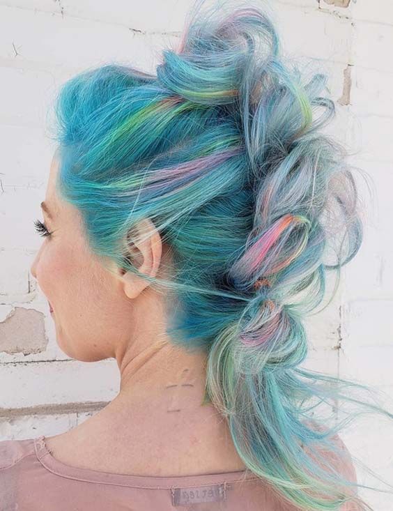 Fantastic trends of messed up knotted braided mohawk hairstyles .