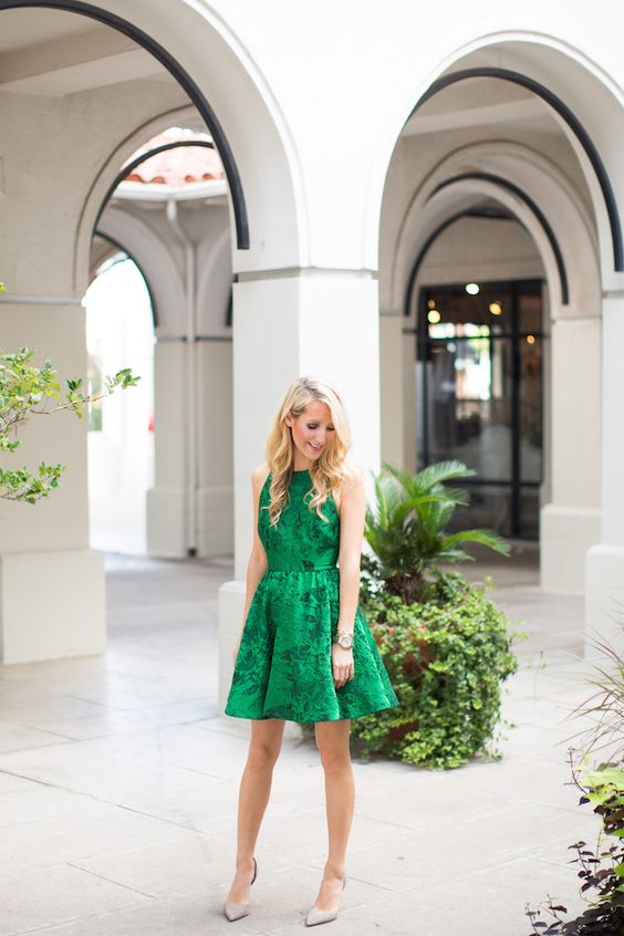 Picture Of sleeveless emerald green floral print dress with a .