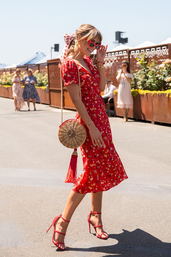 Picture Of a hot red floral print midi dress with short sleeves .
