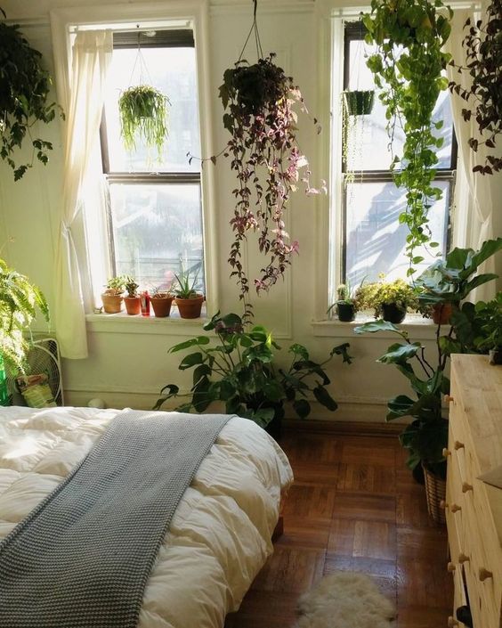 such a pretty bedroom full of greenery | Bohemian bedroom decor .