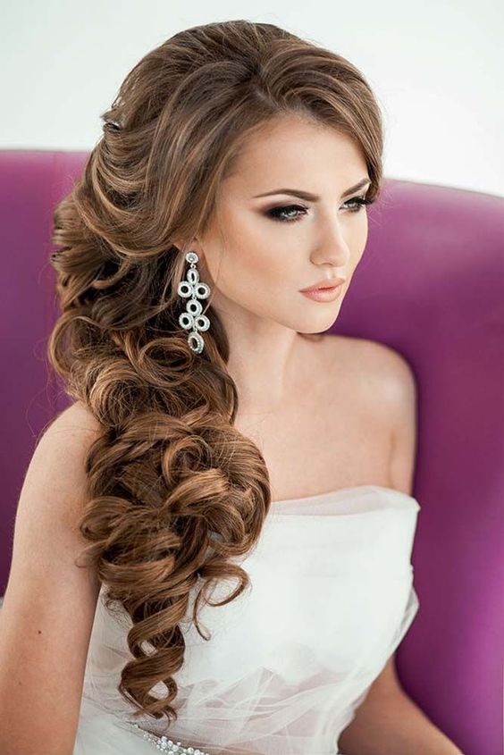 Picture Of elegant side swept curls with side ban