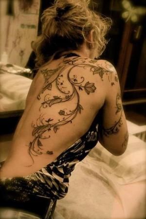 Cool #wispy back tattoo #arm and back tattoo #flow tattoo #black .