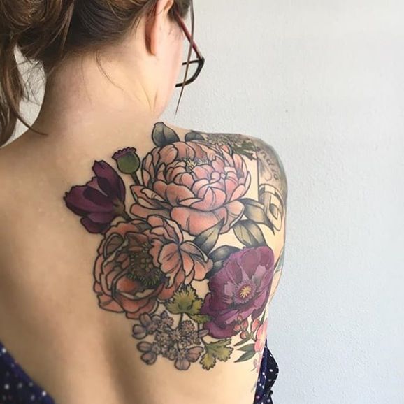 Large floral upper back tattoo by D'Lacie Jeanne. #flower #floral .