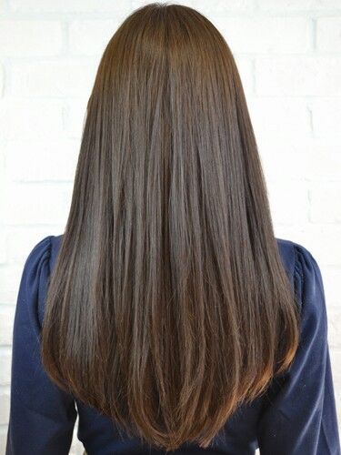 Straight Long Chocolate-Brown Hair with Heavy Bottom Layering .