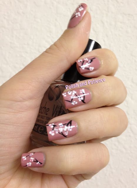 Oh my gosh this is the cutest one yet. Cherry Blossom nail art .