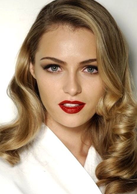 Holiday makeup red lip bronze eye : Get this complete look .