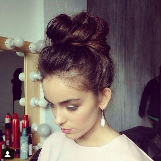 Picture Of messy top knot hairsty