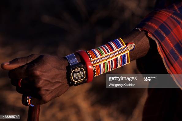 Kenya, Amboseli, Masai Man, Close-up Of Arm Jewelery With Modern .