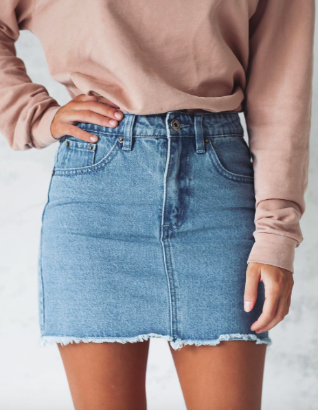 Simple denim skirts can go with so much they make outfits easy .