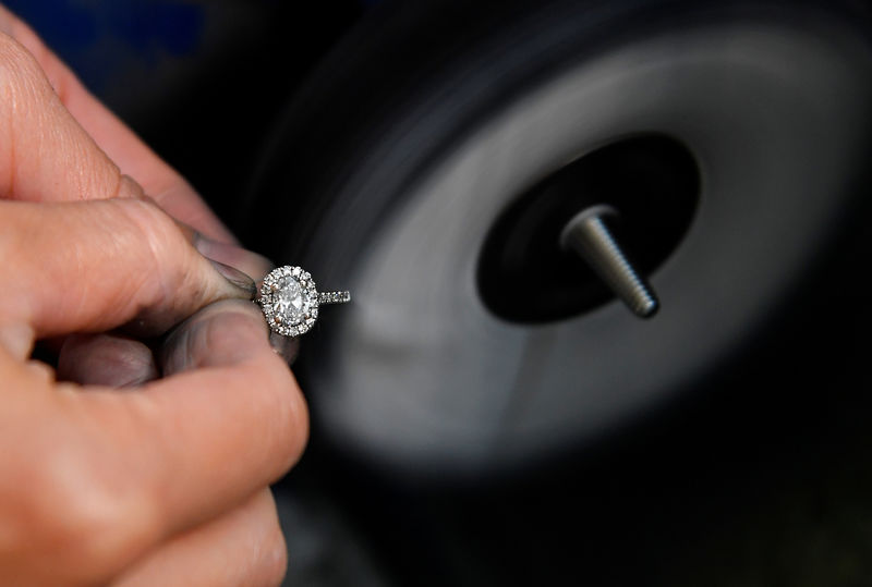 Hammers, chisels and a microscope: inside a diamond jewelery .