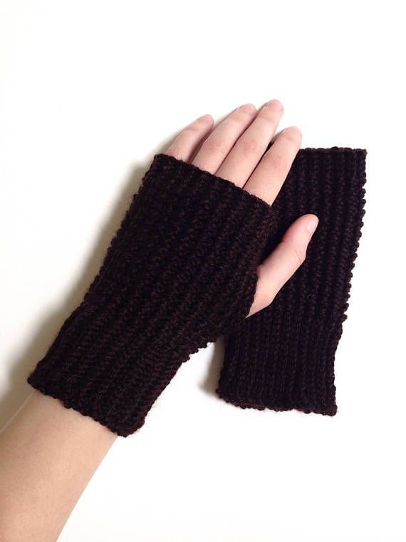 Warm gloves for winter in a simple textured design. Fingerless .