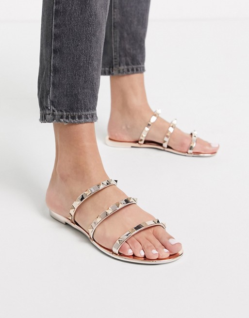Public Desire Cosmic studded flat jelly sandals in rose gold | AS