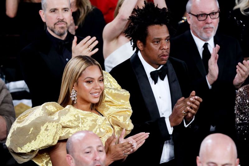 Beyoncé, JAY-Z and Her Jaw-Dropping Dress Sneak Into the Golden .